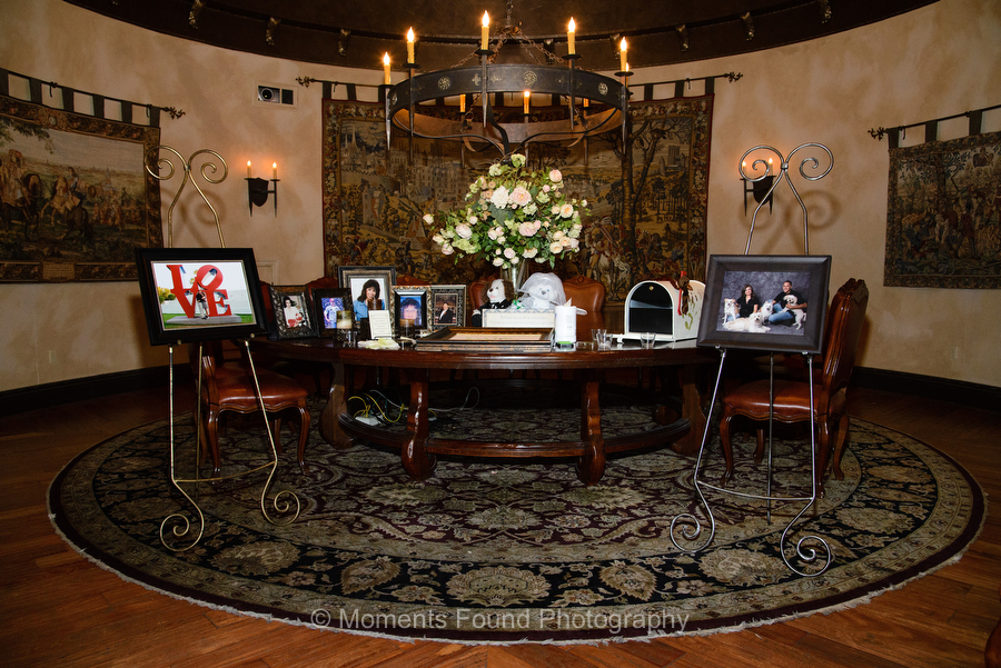 The day was filled with a fun energy. The guest sign-in table was covered with pictures of the couple - some with their dog and one with letters spelling out L-O-V-E. Seating assignments were found under a sign that read ‘You can find your seating assignment here but your place is on the dance floor.’